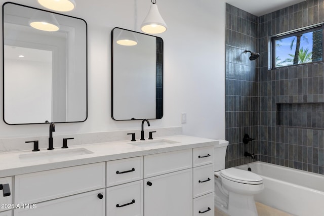 4301 E Sells Dr, Phoenix, AZ 85018 - full bath with double vanity, shower / tub combination, and toilet