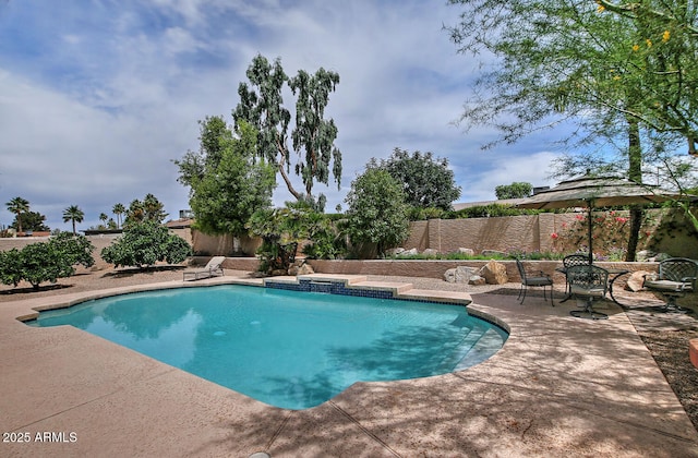 9476 E Laurel Ln, Scottsdale, AZ 85260 - view of swimming pool with a patio area, a fenced backyard, and an in-ground hot tub