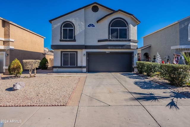 view of front of house with a garage