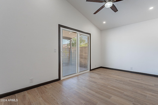 unfurnished room with ceiling fan, high vaulted ceiling, and light wood-type flooring