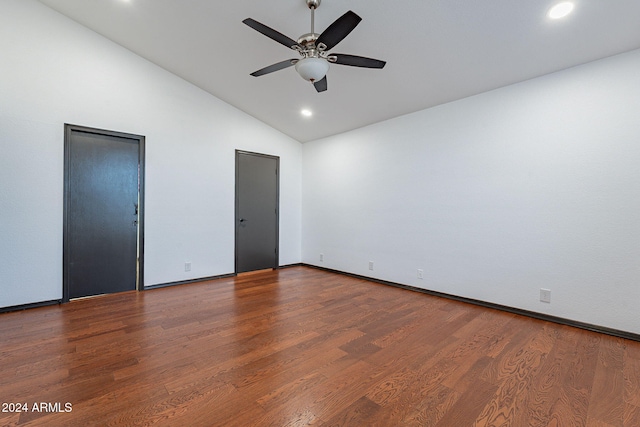 interior space featuring hardwood / wood-style flooring, ceiling fan, and lofted ceiling