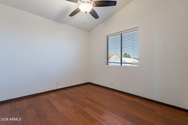 spare room featuring ceiling fan, wood-type flooring, and lofted ceiling