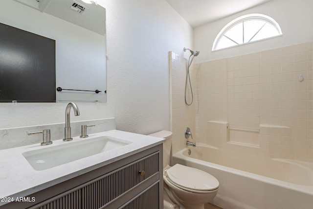 full bathroom featuring vanity, toilet, and shower / bath combination