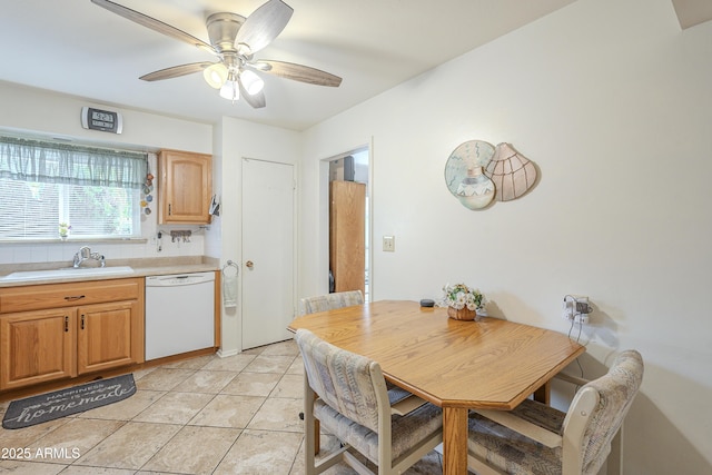 dining area featuring light tile patterned floors and ceiling fan