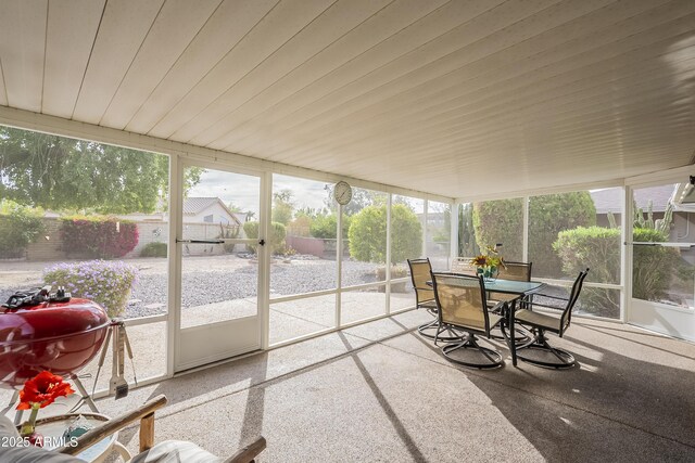 sunroom / solarium with wood ceiling