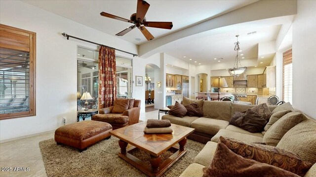 living room with ceiling fan