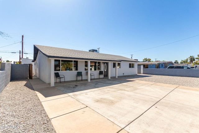 ranch-style house featuring a patio area