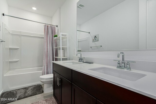 full bathroom with vanity, toilet, wood-type flooring, and shower / tub combo with curtain