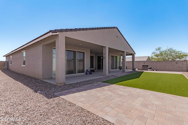 3454 E Jasmine Way, San Tan Valley, AZ 85143 - back of house with stucco siding, a fenced backyard, and a patio area