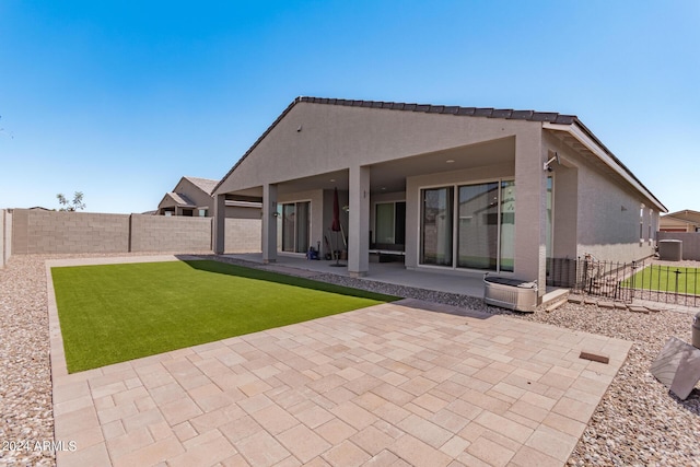 3454 E Jasmine Way, San Tan Valley, AZ 85143 - rear view of property with a patio, a fenced backyard, a lawn, and stucco siding