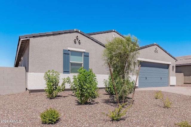 3454 E Jasmine Way, San Tan Valley, AZ 85143 - view of front facade with stucco siding, driveway, an attached garage, and fence