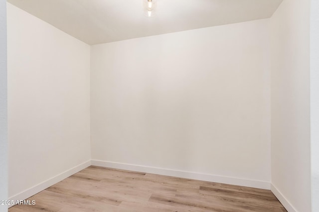 9414 N 50th Dr, Glendale, AZ 85302 - empty room with baseboards and light wood-style flooring