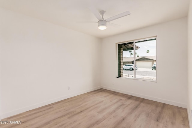 9414 N 50th Dr, Glendale, AZ 85302 - spare room with light wood finished floors, baseboards, and a ceiling fan