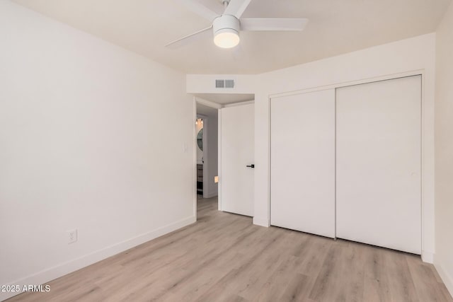 9414 N 50th Dr, Glendale, AZ 85302 - unfurnished bedroom featuring wood finished floors, baseboards, a closet, and ceiling fan