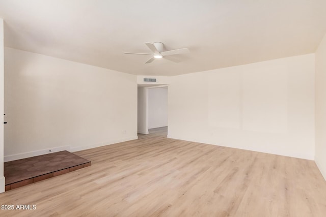 9414 N 50th Dr, Glendale, AZ 85302 - spare room with ceiling fan, wood finished floors, and baseboards