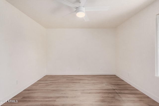 9414 N 50th Dr, Glendale, AZ 85302 - empty room featuring a ceiling fan, light wood-style floors, and baseboards