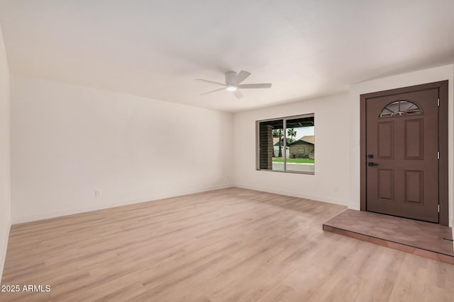 9414 N 50th Dr, Glendale, AZ 85302 - entryway with a ceiling fan, light wood finished floors, and baseboards