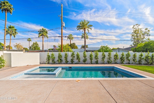 view of pool featuring a fenced backyard, a patio area, and a pool with connected hot tub