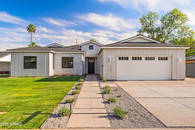 view of front facade featuring board and batten siding, an attached garage, concrete driveway, and a front lawn