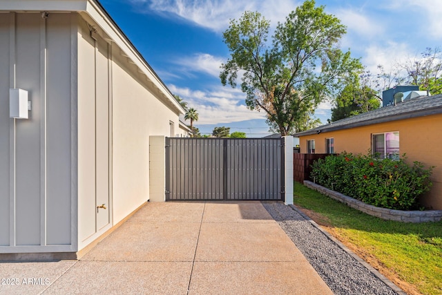 view of gate featuring fence
