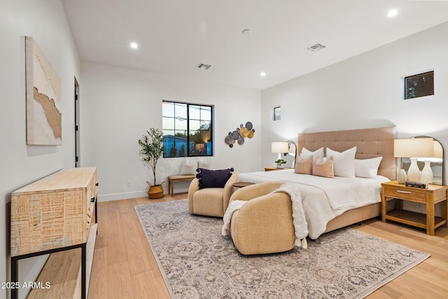 bedroom featuring visible vents, recessed lighting, and light wood-style floors