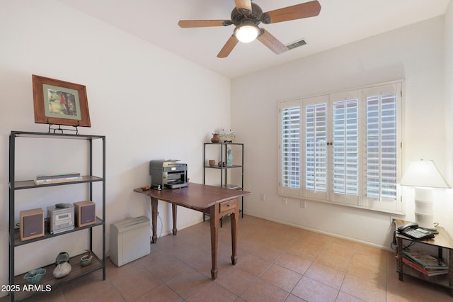 home office featuring ceiling fan and light tile patterned floors