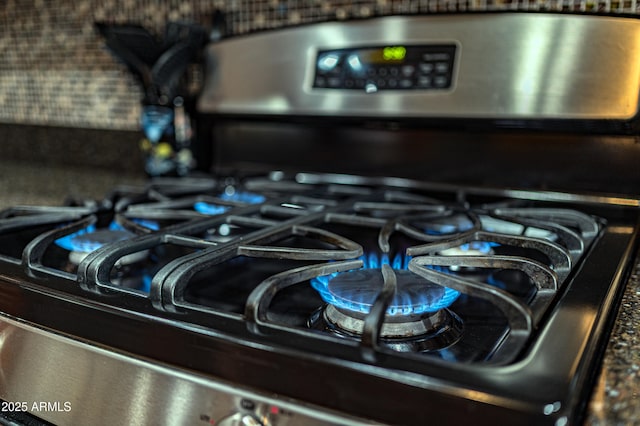 interior details featuring stainless steel gas range oven