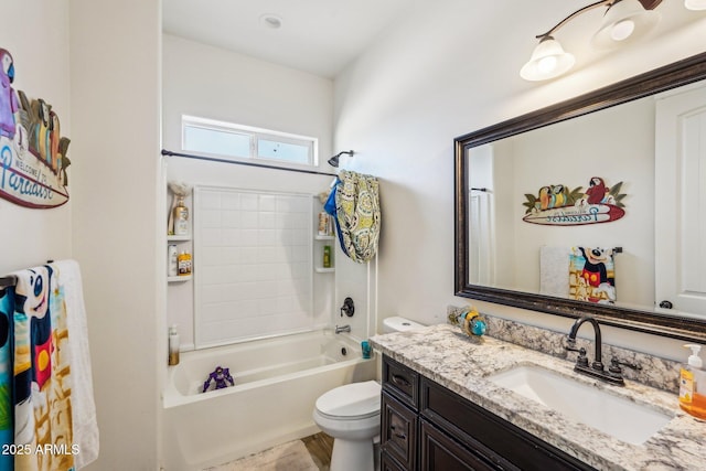 full bathroom with vanity, bathing tub / shower combination, and toilet