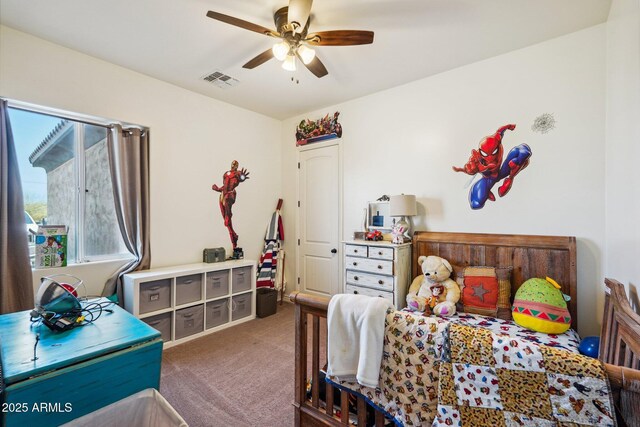 bedroom with ceiling fan and carpet