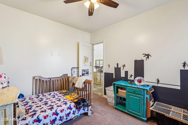 bedroom with ceiling fan and carpet