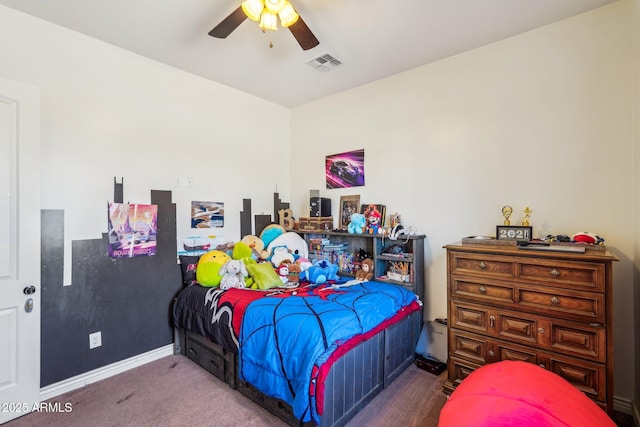 bedroom with dark carpet and ceiling fan