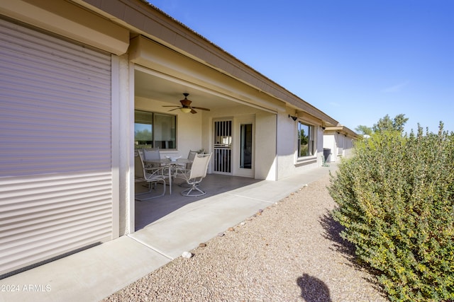 view of patio / terrace featuring ceiling fan