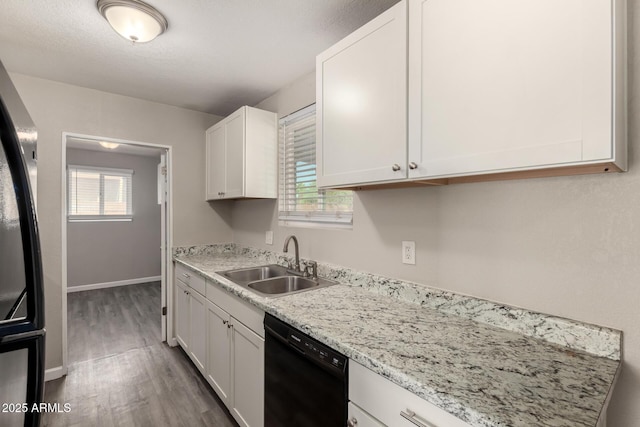 6139 N 31st Dr, Phoenix, AZ 85017 - kitchen with a sink, wood finished floors, black appliances, and a wealth of natural light