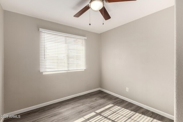 6139 N 31st Dr, Phoenix, AZ 85017 - unfurnished room featuring a ceiling fan, baseboards, and wood finished floors
