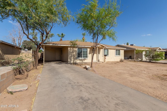 6139 N 31st Dr, Phoenix, AZ 85017 - single story home featuring fence, stucco siding, an attached carport, and driveway