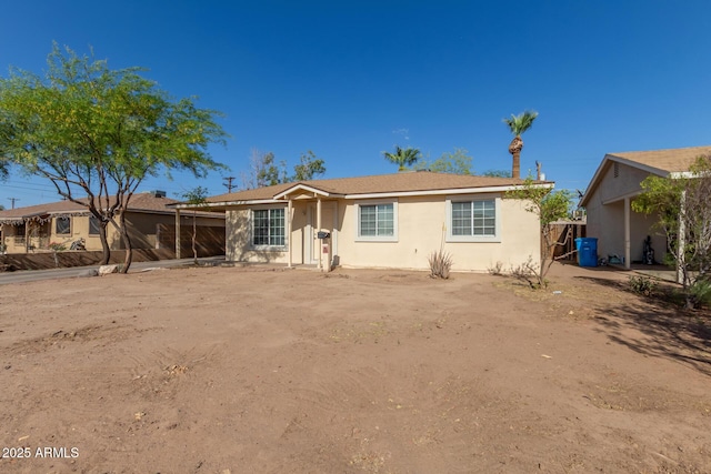 6139 N 31st Dr, Phoenix, AZ 85017 - view of front facade with stucco siding and fence