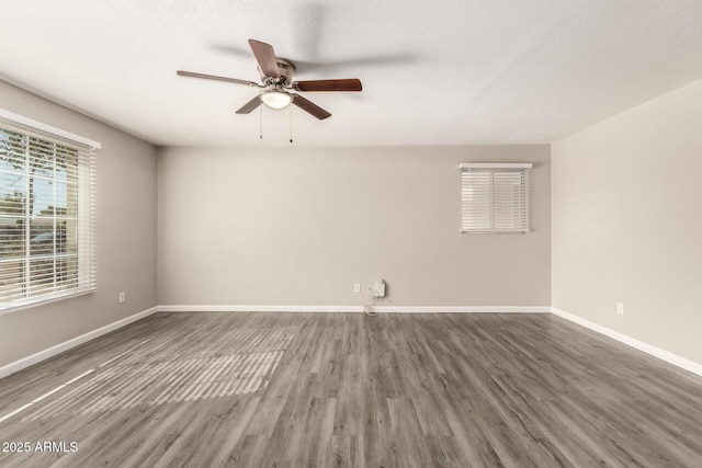 6139 N 31st Dr, Phoenix, AZ 85017 - empty room with baseboards, a ceiling fan, and wood finished floors