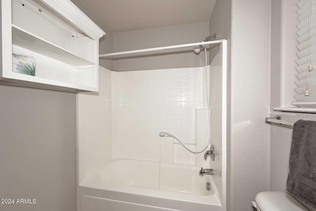 bathroom with shower / bathtub combination and toilet