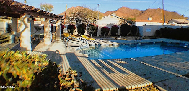 view of pool featuring a fenced in pool and a patio