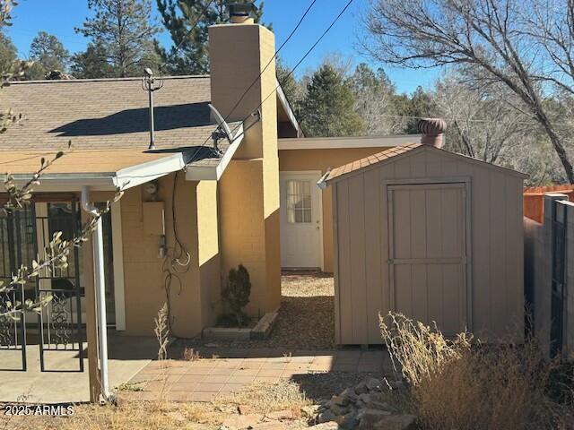 exterior space with a storage unit