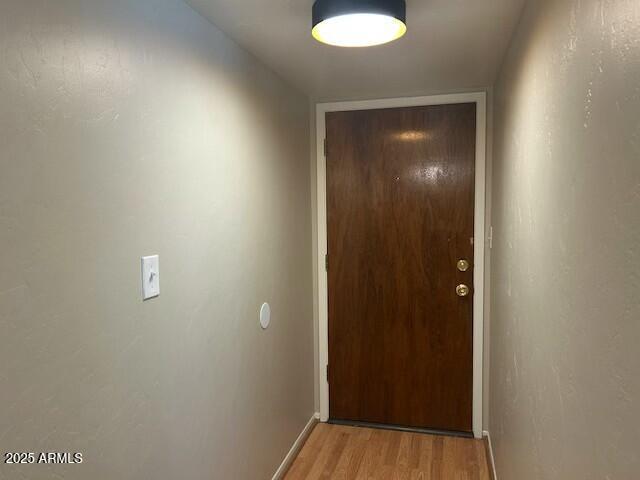 doorway featuring light hardwood / wood-style flooring