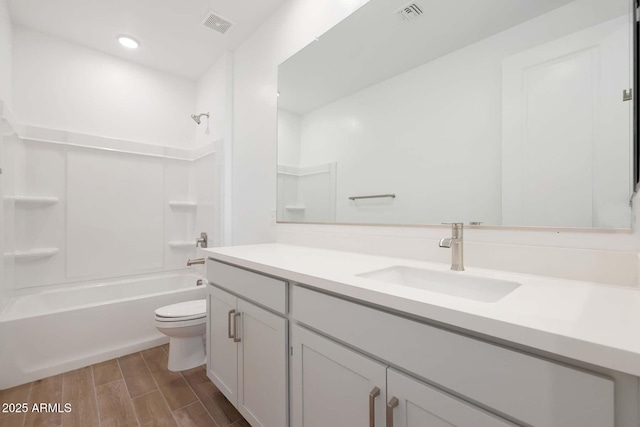 full bathroom with vanity, toilet, and bathing tub / shower combination