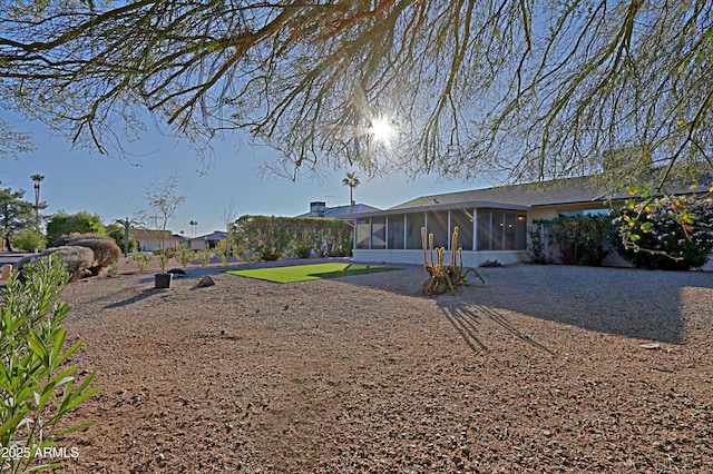 exterior space with a sunroom