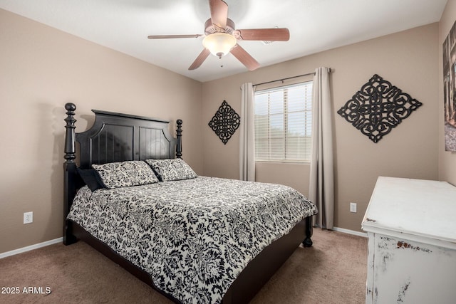 bedroom featuring baseboards, a ceiling fan, and carpet floors