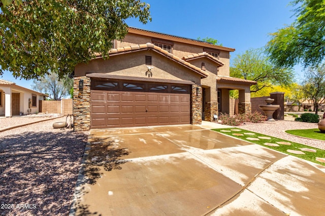 view of front of home with stucco siding, driveway, an attached garage, and stone siding