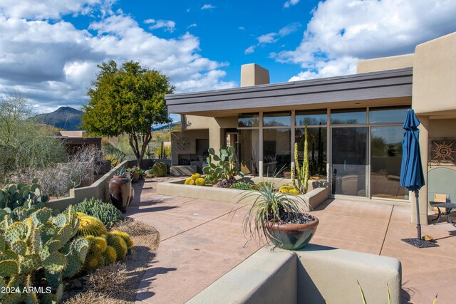 view of patio featuring a mountain view