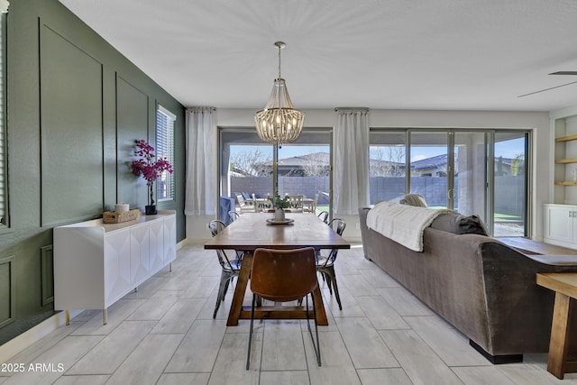 dining space with an inviting chandelier and a wealth of natural light