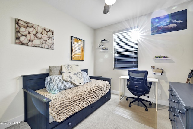 bedroom featuring baseboards and ceiling fan