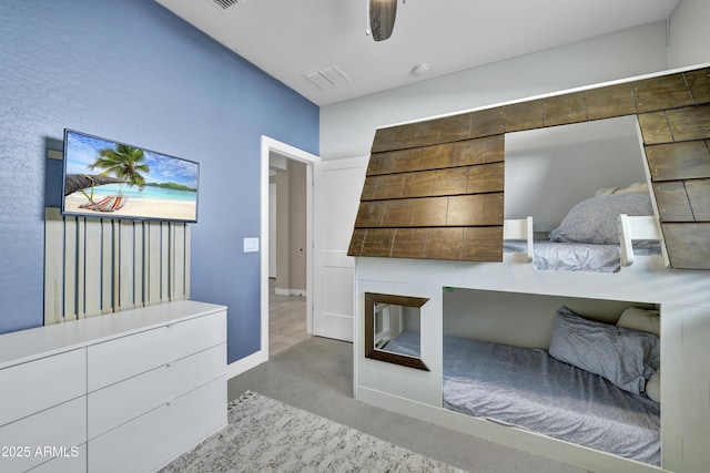 bedroom featuring baseboards, visible vents, and carpet floors