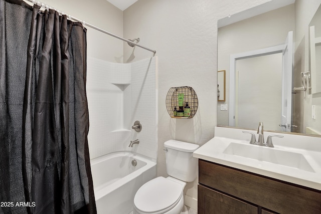 bathroom with toilet, vanity, and shower / bath combo with shower curtain